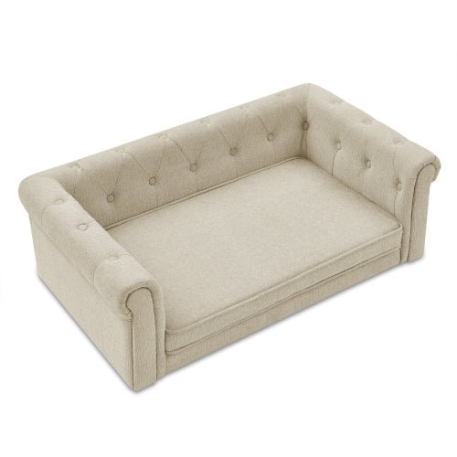 Beige luxury dog bed with rolled armrests and tufted back for medium to large dogs