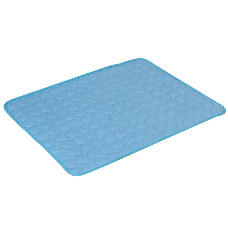 Light blue ice silk pet cooling mat with quilted hexagon texture design for dogs and cats.