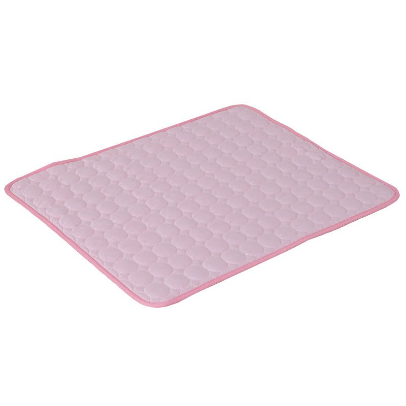 Pink ice silk pet cooling mat with quilted diamond pattern design for dogs and cats.
